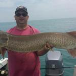 Joe with a July Monster
 53.25" by 23"